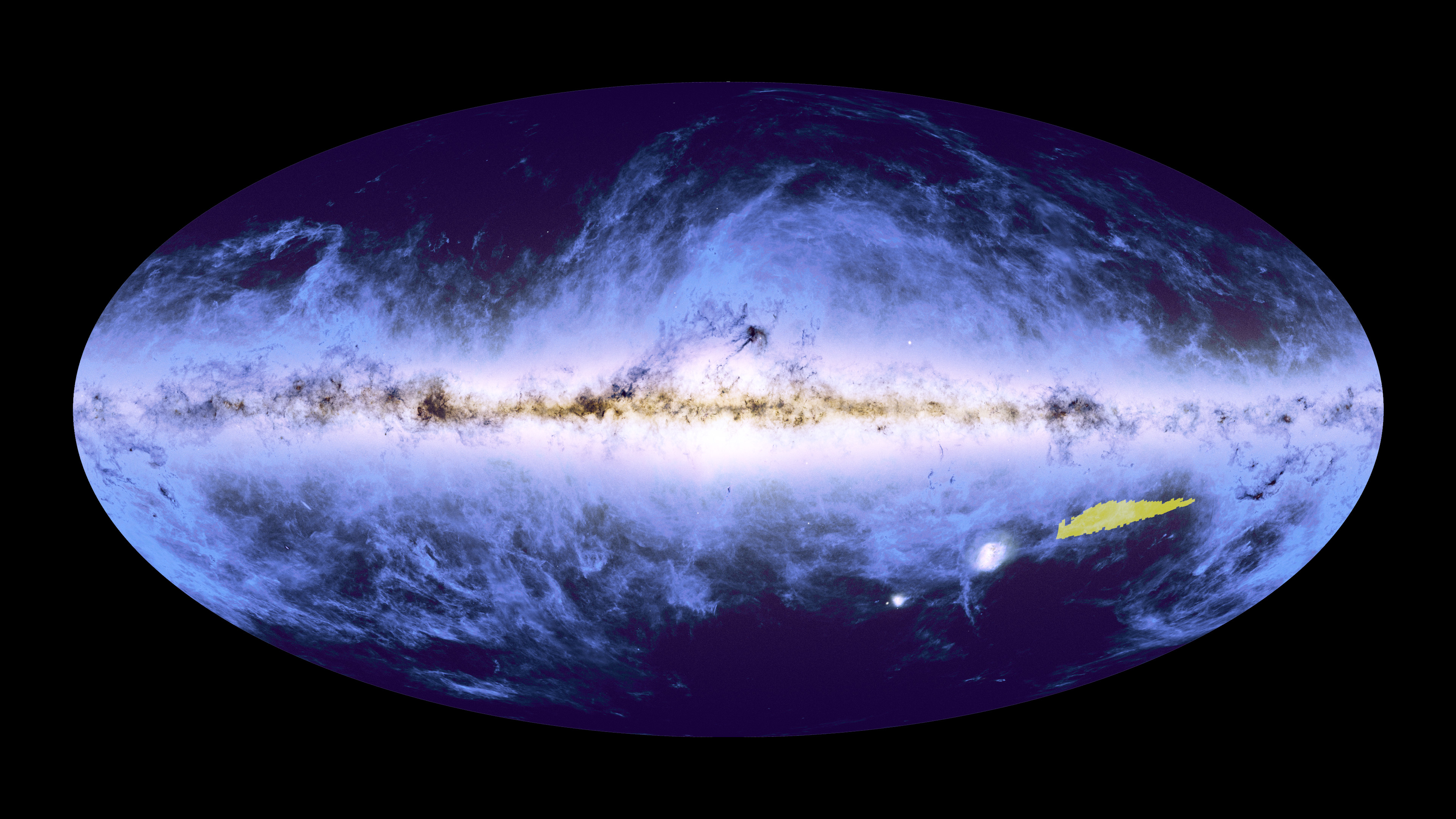 Mappa combinata di dati Gaia e Planck della volta celeste con evidenziata in giallo l'area oggetto della pubblicazione del 15 ottobre